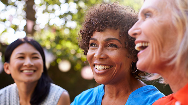Close-up photo of group of smiling women